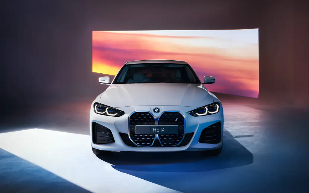BMW I4 Electric Sedan in Studio — desktop and phone wallpaper, free download