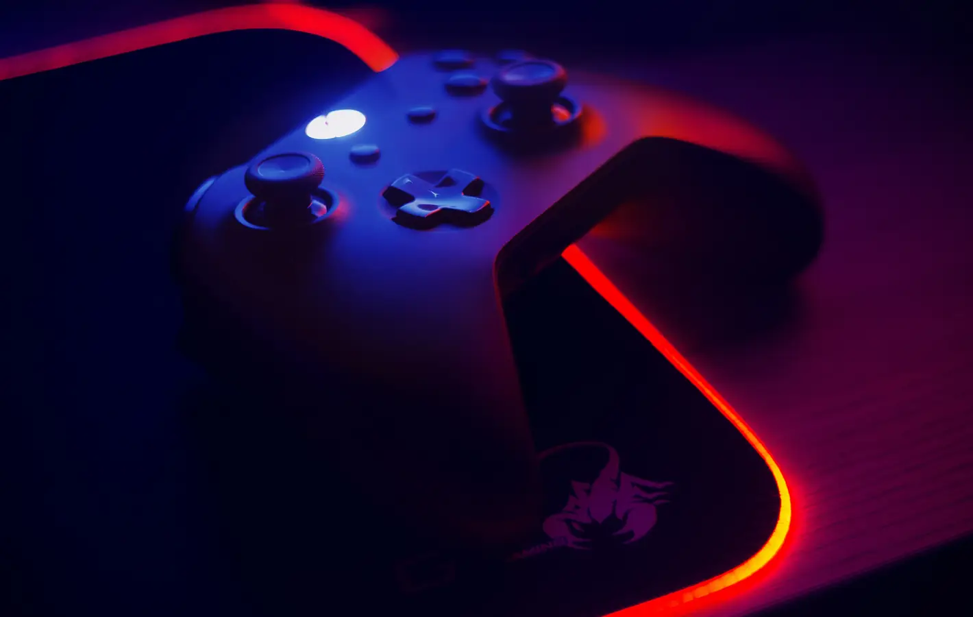 Xbox controller with glowing red light — desktop and phone wallpaper, free download