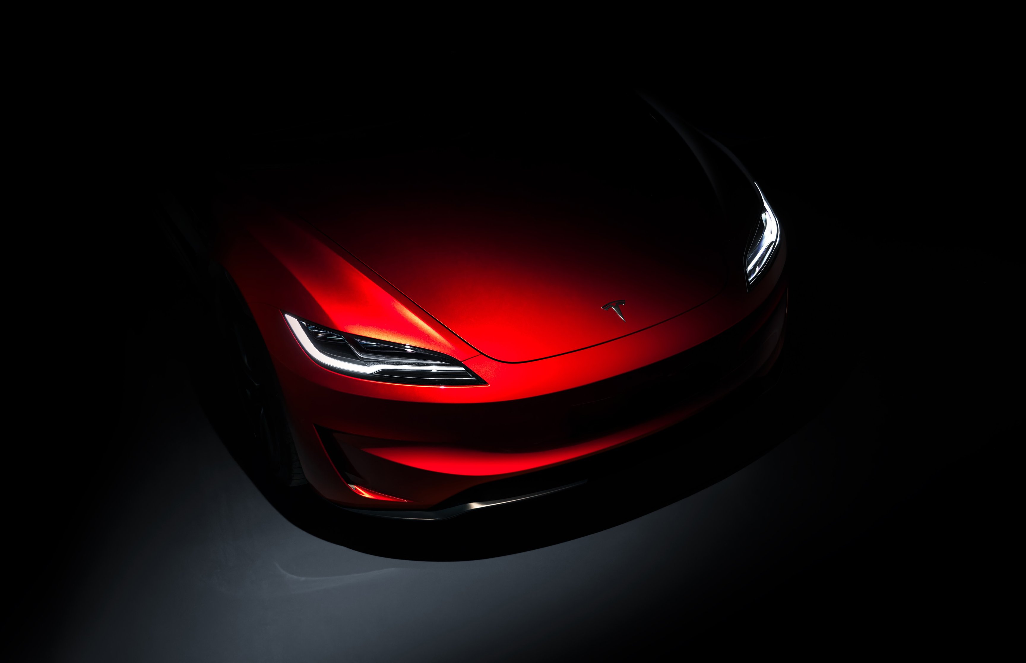 Red Tesla Model 3 Performance Highland - Wallpapers for Apple MacBook 16.2″ in 3456x2234 resolution