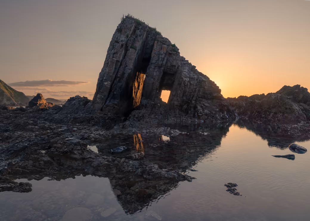 Sunset Stone Arch on Spain Coast — desktop and phone wallpaper, free download