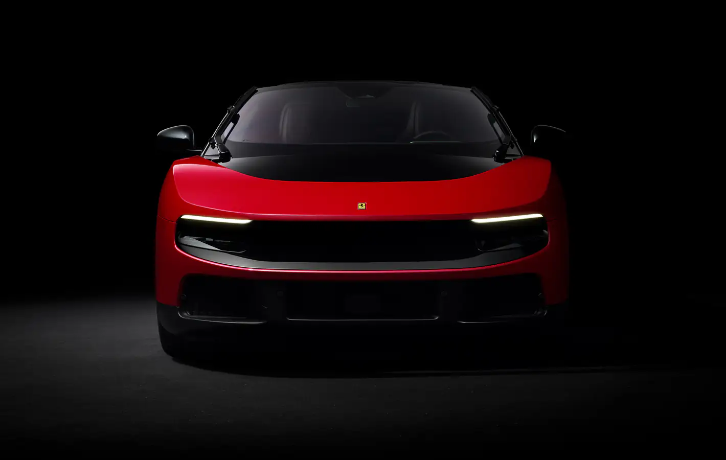 Red Ferrari Luce front view — desktop and phone wallpaper, free download