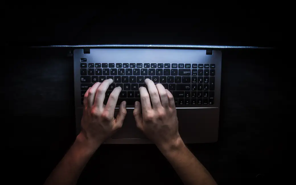 Man Typing on Laptop Keyboard — desktop and phone wallpaper, free download