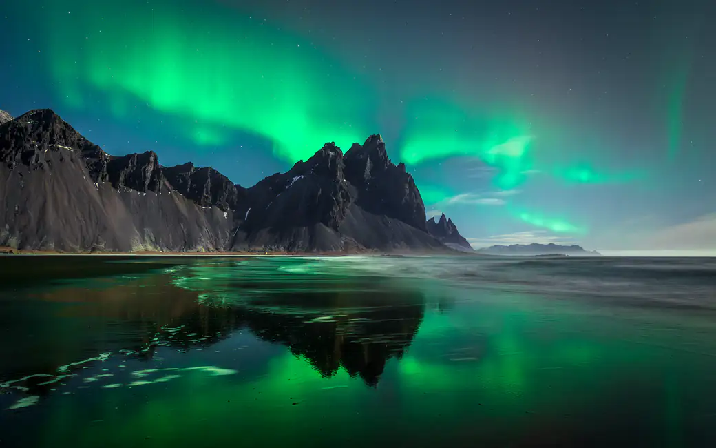 Northern Lights over Mount Vestrachorn in Iceland — desktop and phone wallpaper, free download
