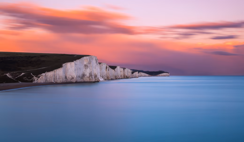 Sunset over Englands Coastal Cliffs - Wallpapers for MacBook Neo in 2408x1506 resolution