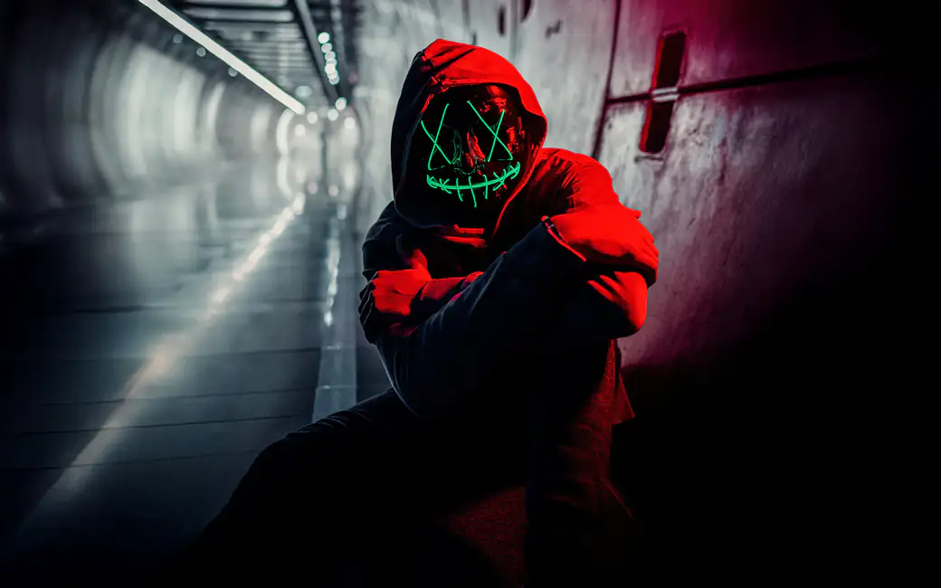 Man in Neon Purge Mask — desktop and phone wallpaper, free download
