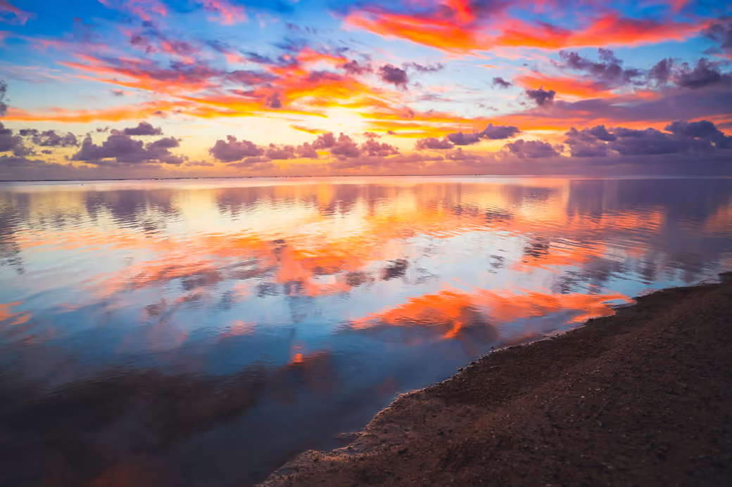 Red sunset over the river and shore - Wallpapers for MacBook Neo in 2408x1506 resolution