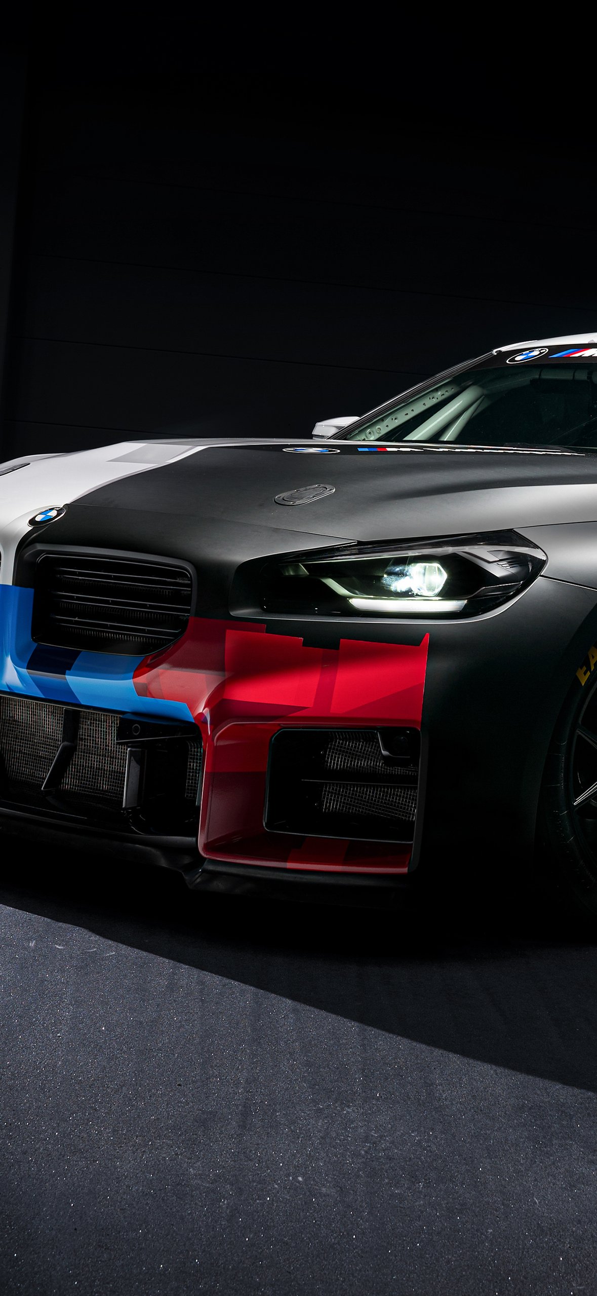 Racing BMW M2 with livery - Wallpapers for iPhone 14 Pro/15 Pro in 1179x2556 resolution