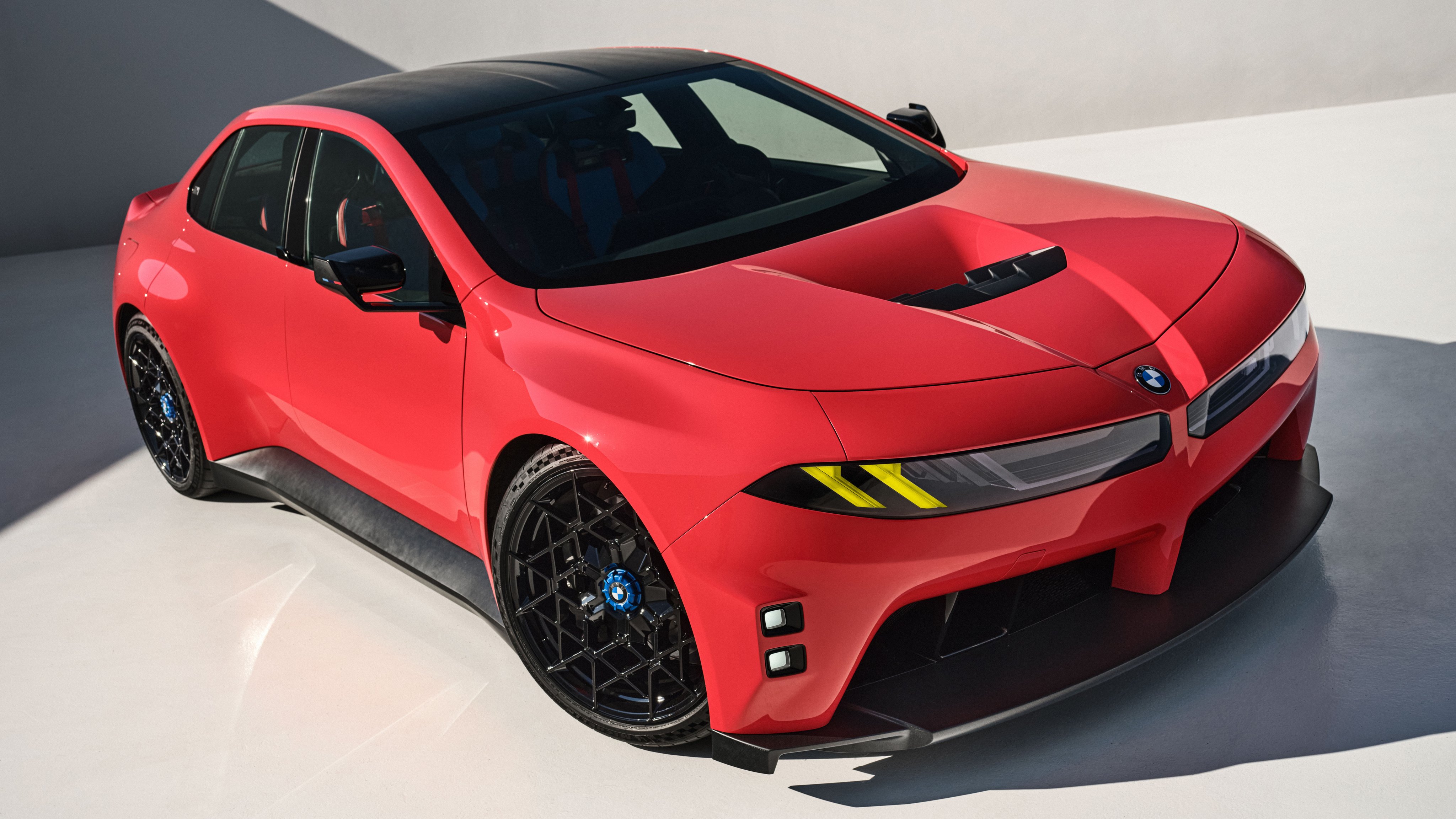 Red BMW M3 Neue Klasse in the studio - Wallpapers for Apple iMac 21.5″ in 4096x2304 resolution