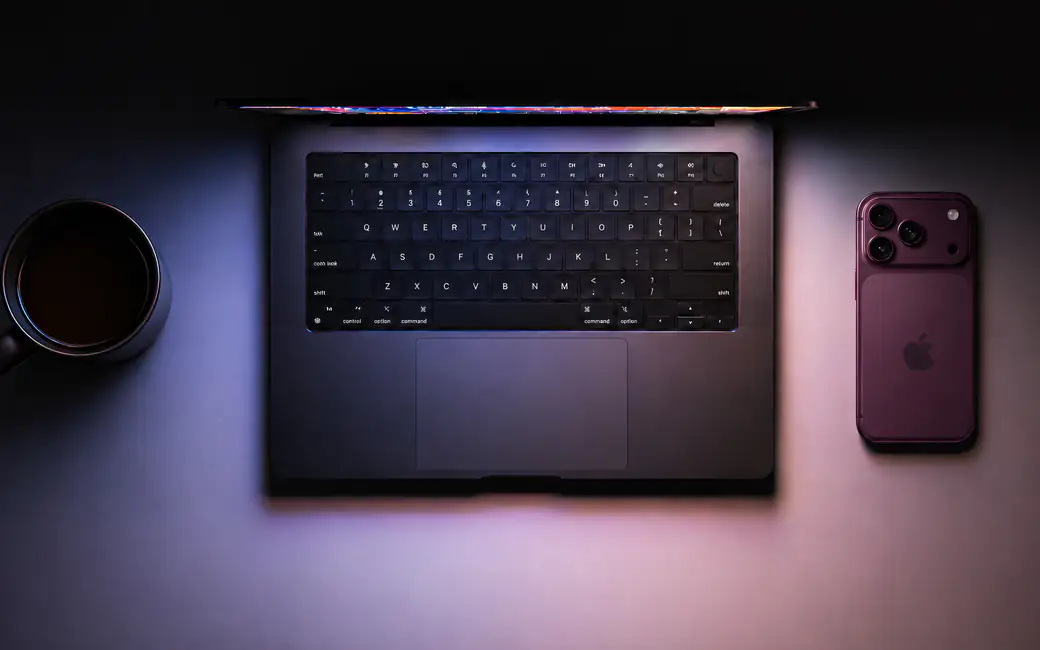 Night Workplace with Macbook and iPhone 18 Pro — desktop and phone wallpaper, free download