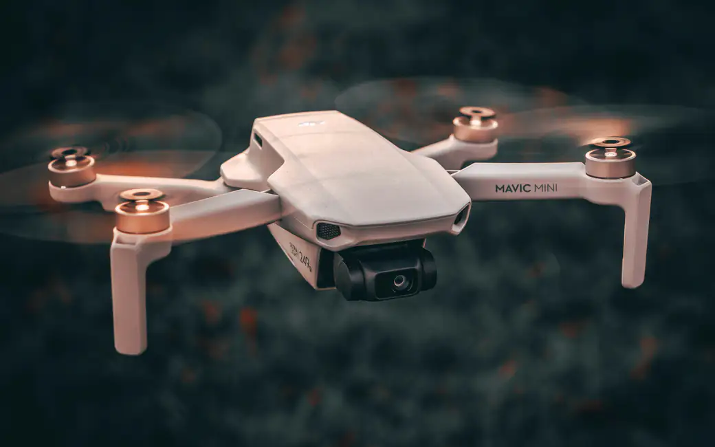 DJI Mavic Mini drone flying — desktop and phone wallpaper, free download