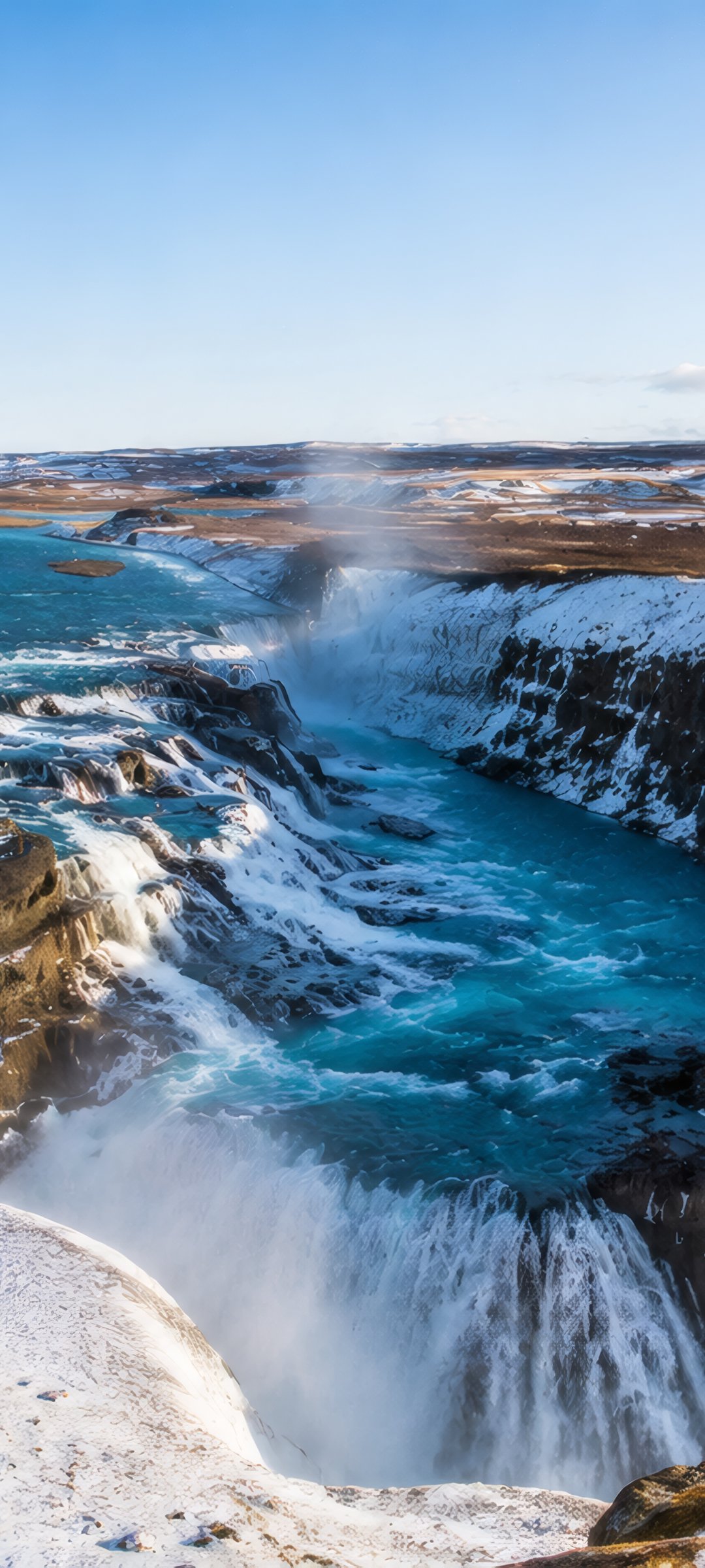 Iceland Winter Canyon with waterfall and river - Wallpapers for Samsung Galaxy M55, POCO M4/X4/X5, Xiaomi Redmi 12/13/Note 13/Note 14/Note 14S in 1080x2400 resolution