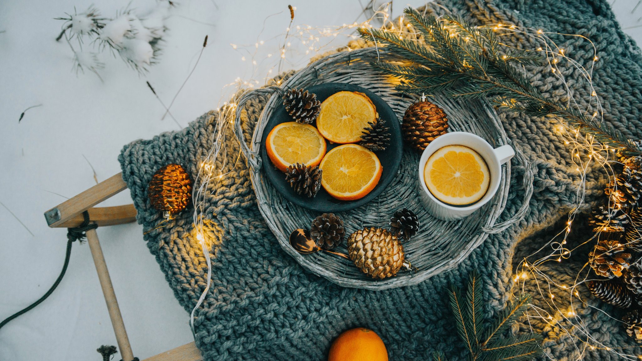 Tea, Orange and Pinecones in Snow - QWXGA wallpapers in 2048x1152 resolution