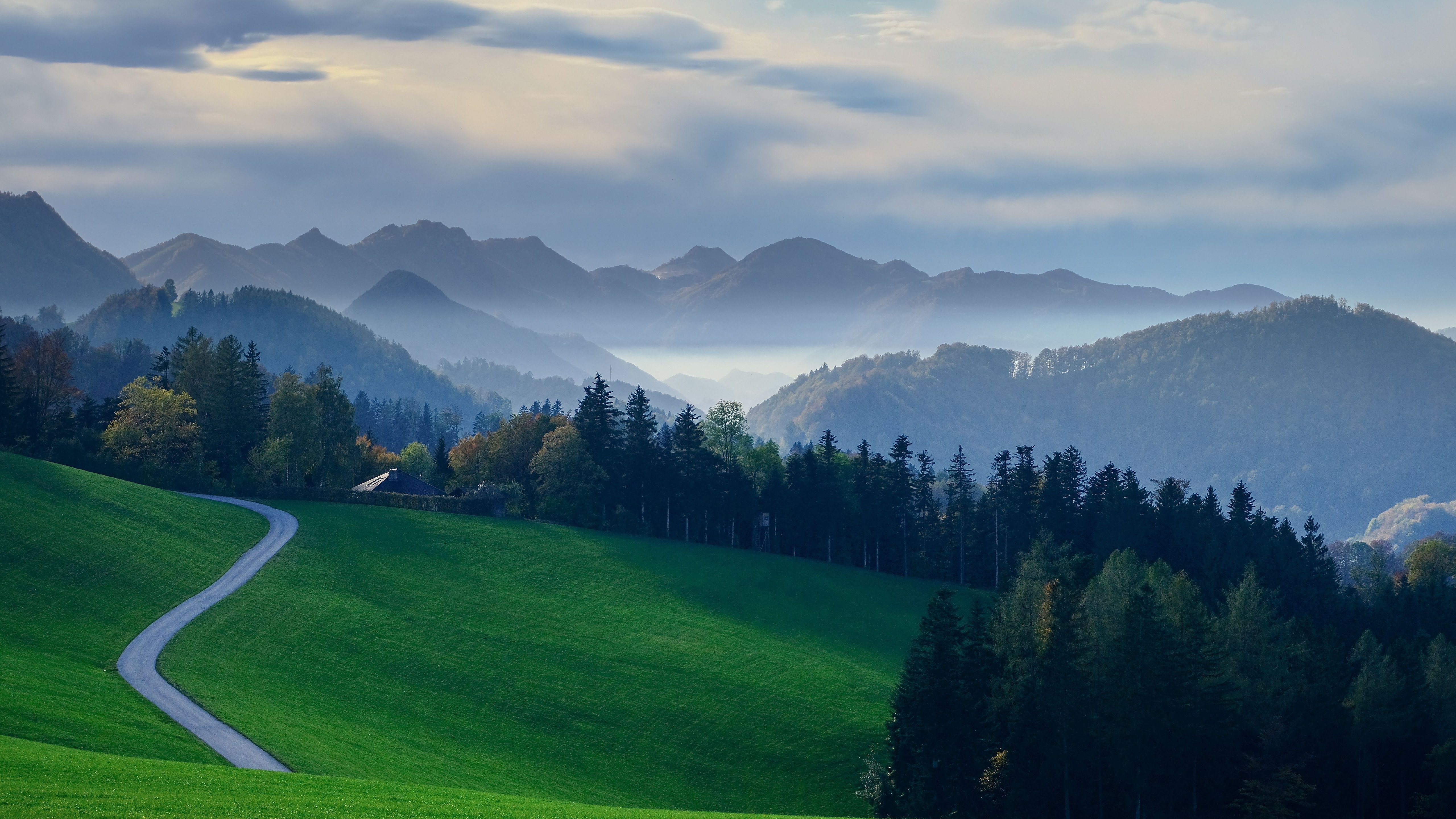 Flat green field and hills - 5K wallpapers in 5120x2880 resolution