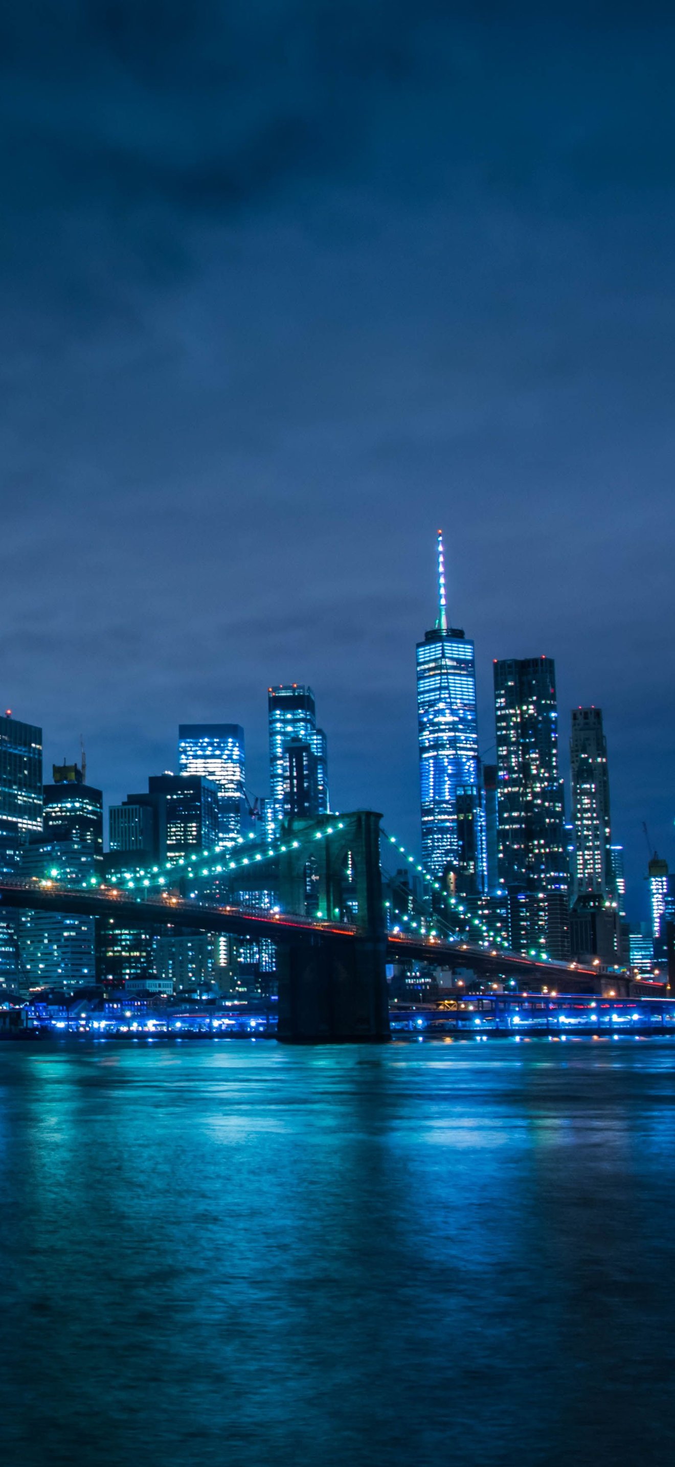 Brooklyn Bridge and Manhattan at night on a blue night - Wallpapers for iPhone 17 Pro Max/16 Pro Max in 1320x2868 resolution