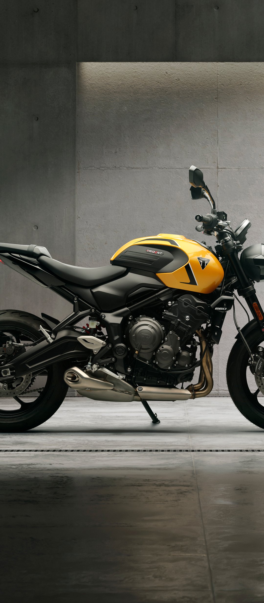 Triumph Trident 660 motorcycle in the garage - Wallpapers for TECNO/Infinix in 1080x2460 resolution