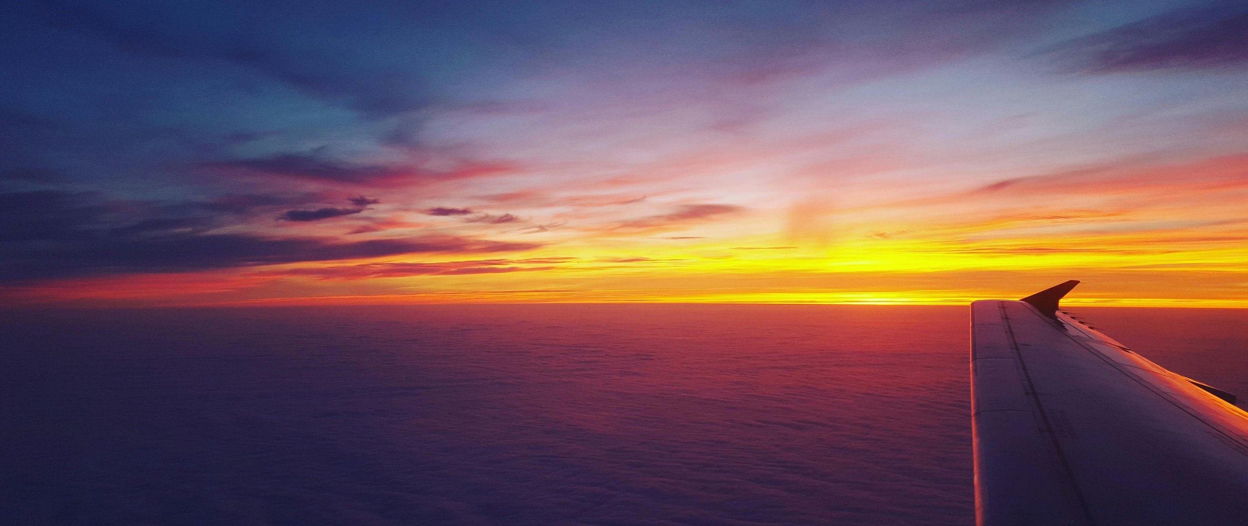 Colorful Sunset from an Airplane - UltraWide 21:9 wallpapers in 2560x1080 resolution