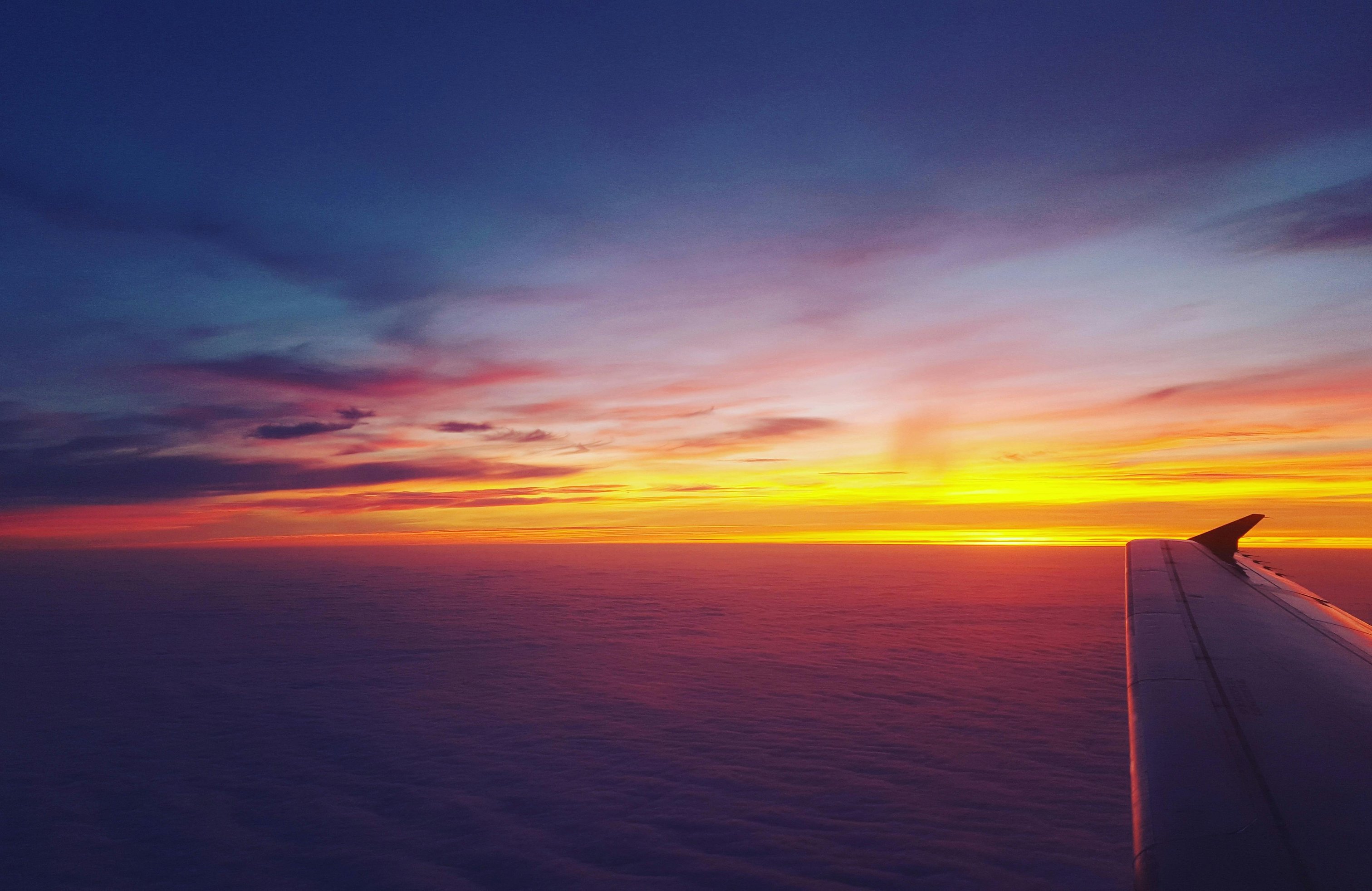 Colorful Sunset from an Airplane - Wallpapers for Apple MacBook 14.2″ in 3024x1964 resolution