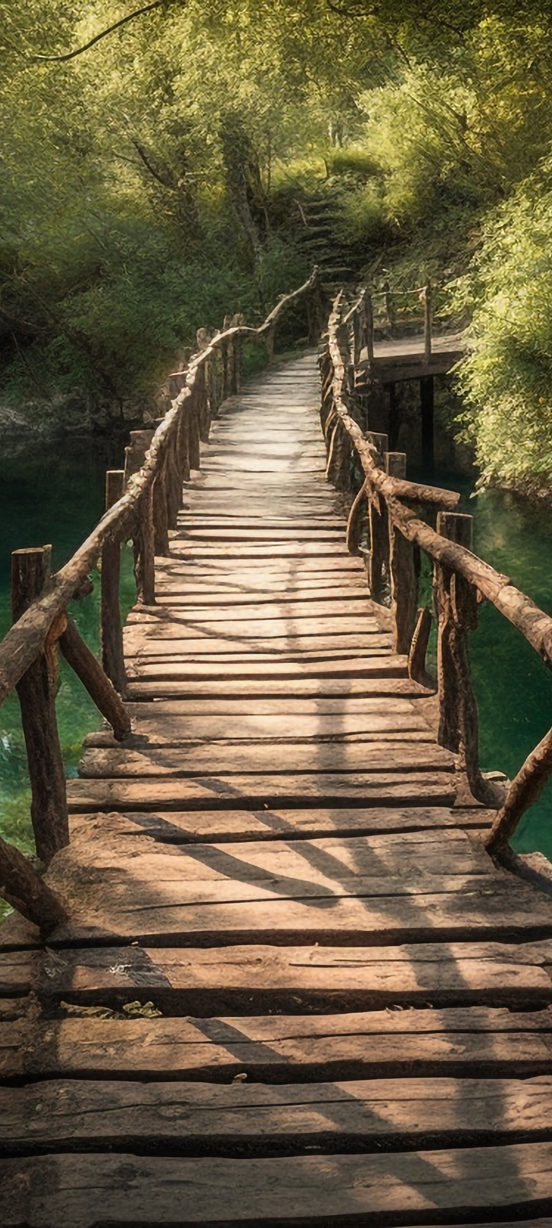 Wooden Bridge Over a Forest River - Wallpapers for Samsung Galaxy M55, POCO M4/X4/X5, Xiaomi Redmi 12/13/Note 13/Note 14/Note 14S in 1080x2400 resolution