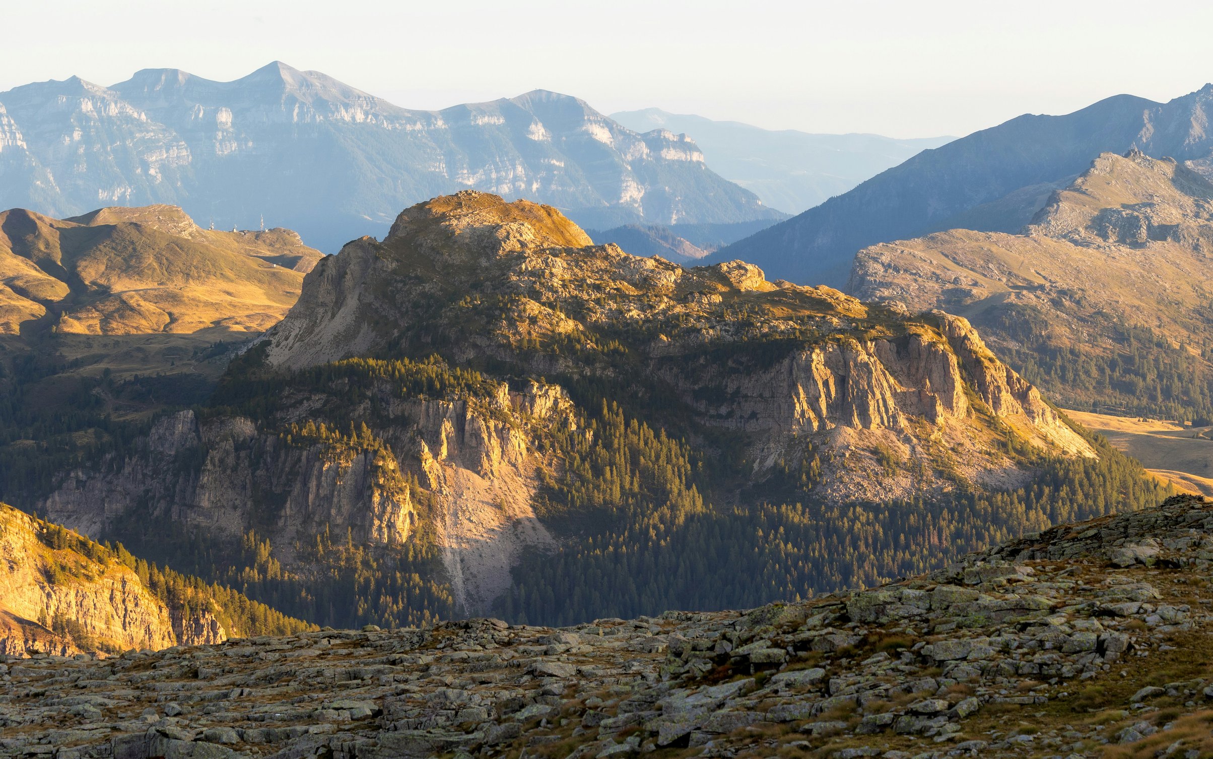 Sunlit Mountain Valleys and Ridges - Wallpapers for MacBook Neo in 2408x1506 resolution