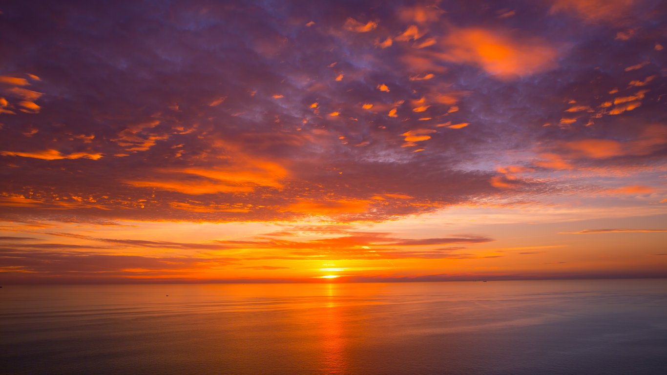 Orange sunset over a calm sea - Laptop Wallpapers in 1366x768 resolution