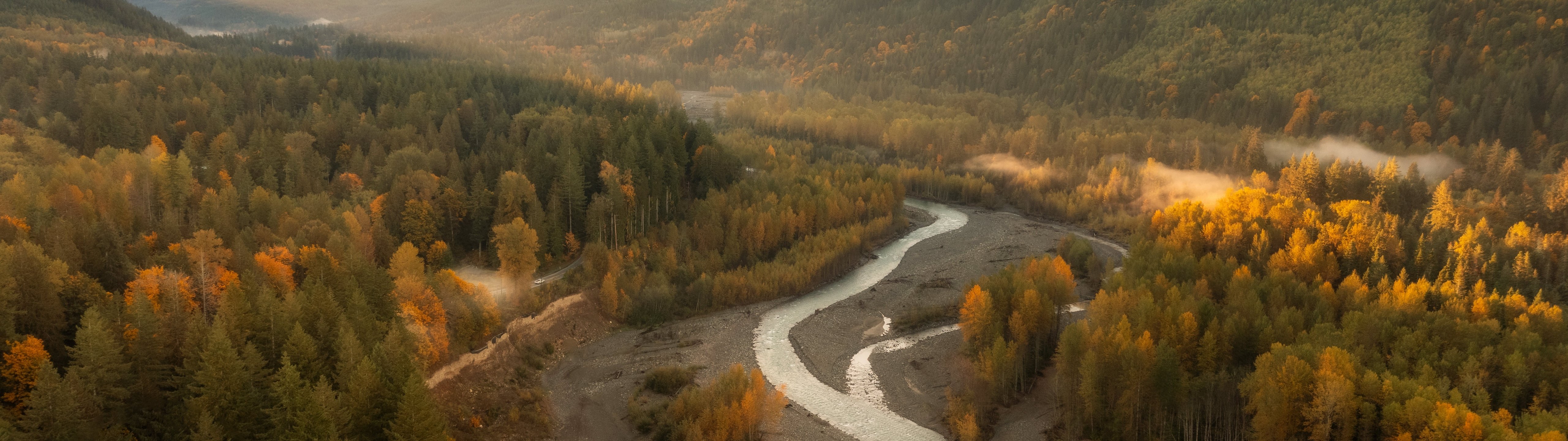 Mountains and a winding stream in autumn - UltraWide 32:9 wallpapers in 5120x1440 resolution