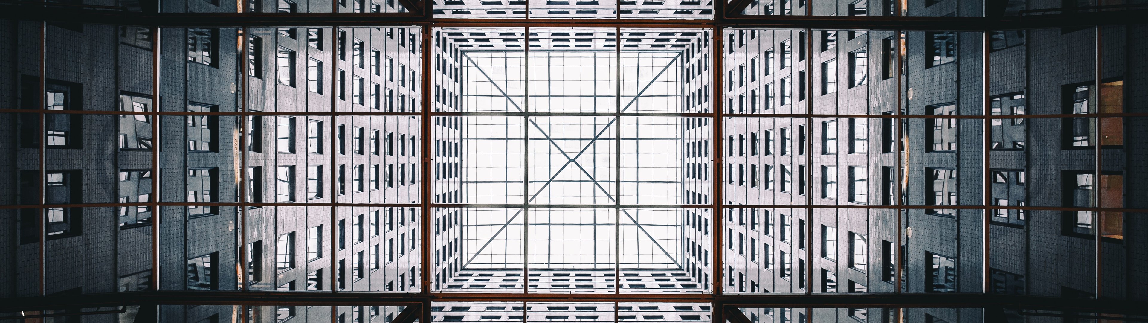 Symmetric Glass Skyscraper Facade - UltraWide 32:9 wallpapers in 3840x1080 resolution