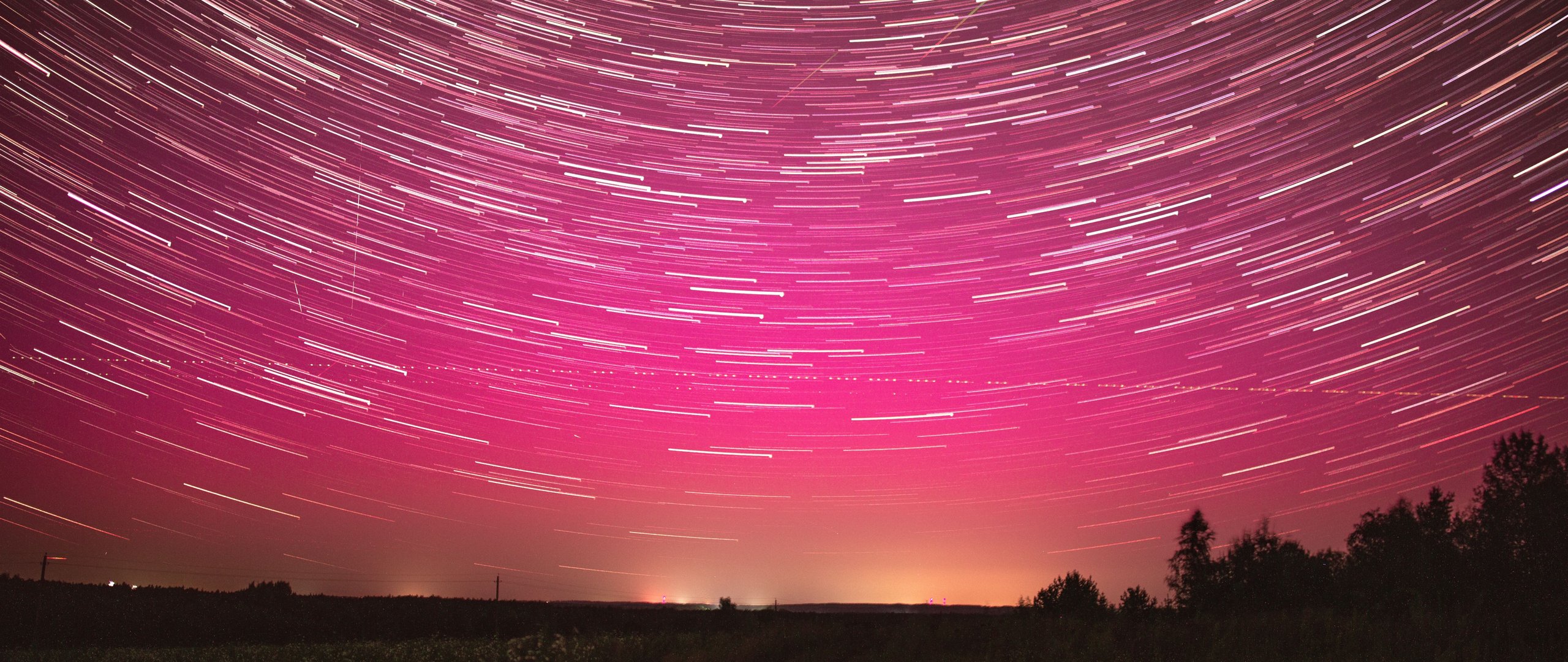 Light trails in the stormy night sky - UltraWide 21:9 wallpapers in 2560x1080 resolution