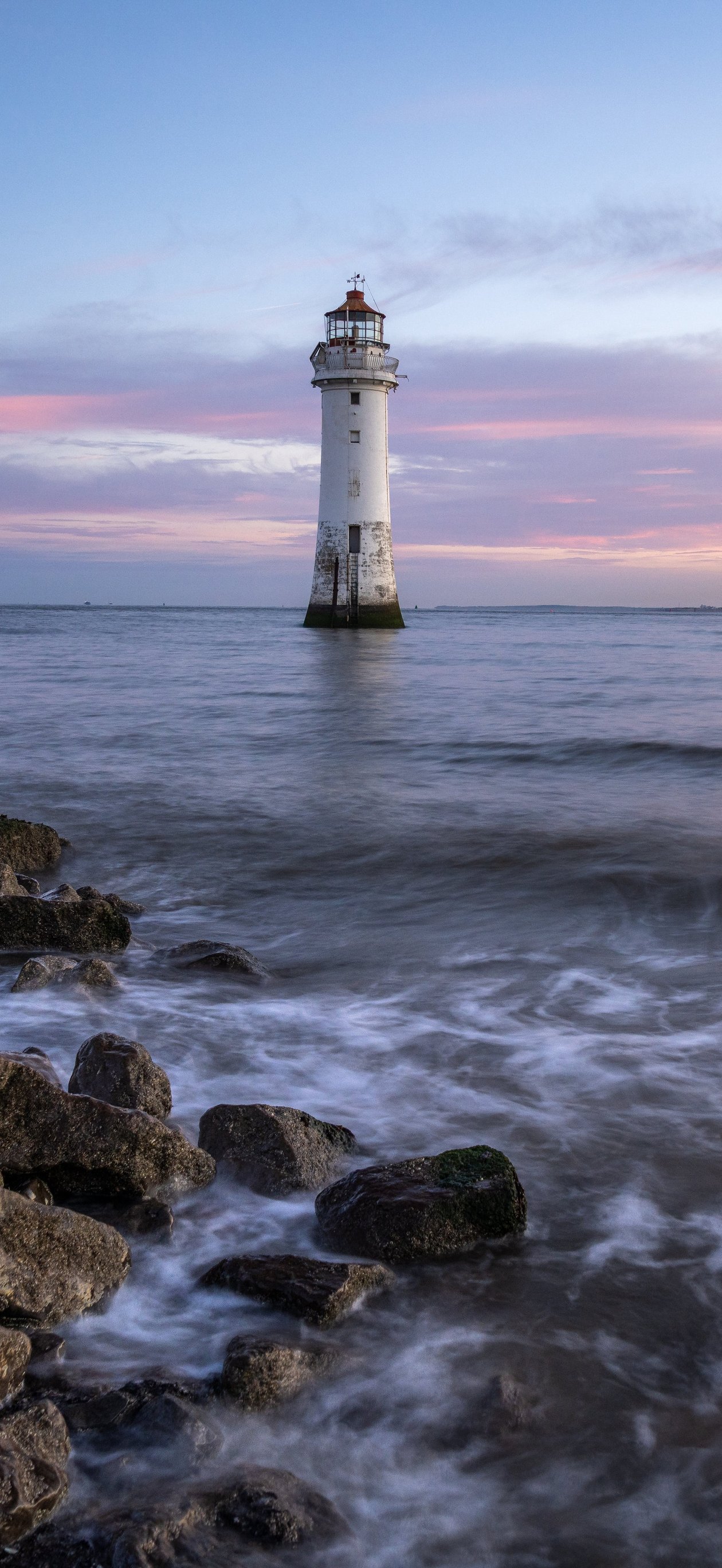 Lighthouse by the Sea at Sunset - Wallpapers for iPhone Air in 1260x2736 resolution