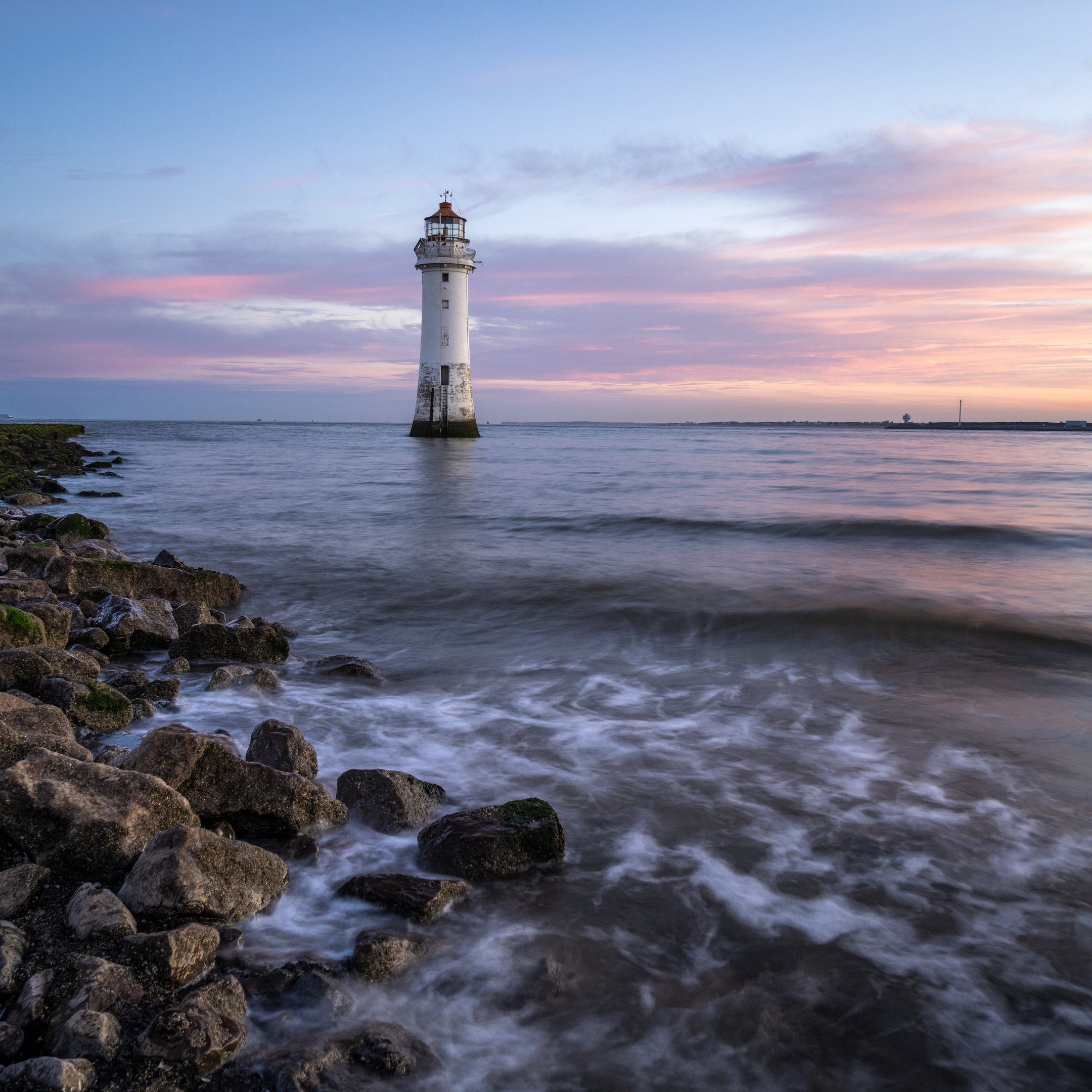Lighthouse by the Sea at Sunset - Wallpapers for iPad 10.2″ in 2160x2160 resolution