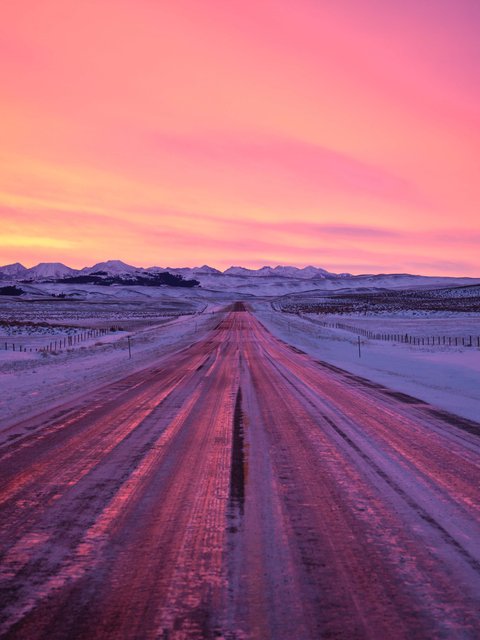 Snow-covered road in a red sunset - Wallpapers for HTC/BlackBerry in 480x640 resolution