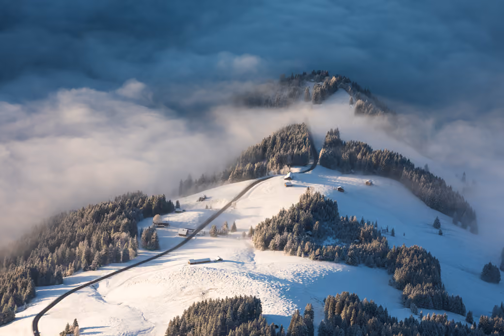 Snow-Covered Mountain Village — desktop and phone wallpaper, free download