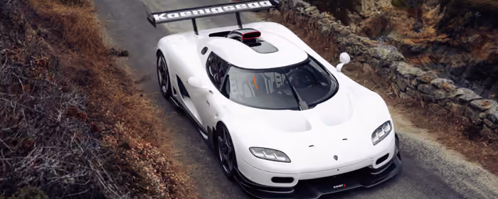 Cars wallpapers: Koenigsegg CCGT1, spoiler, mountains, road