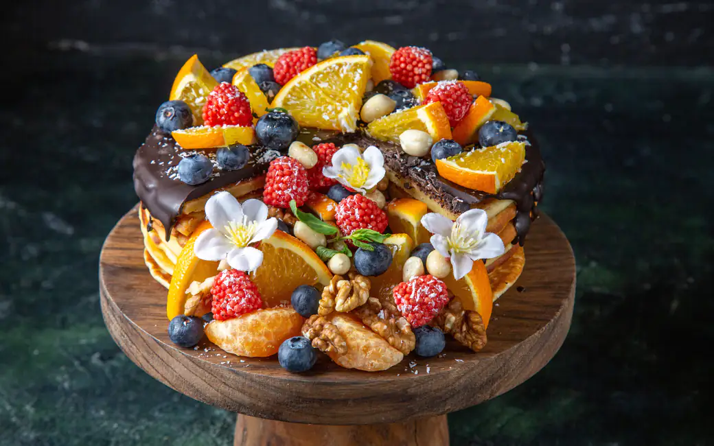Chocolate cake with oranges and berries — desktop and phone wallpaper, free download